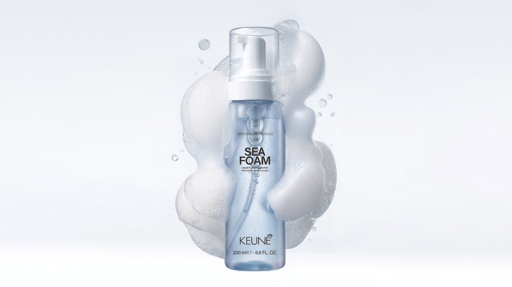 Keune Sea Foam in a cloud of foam.