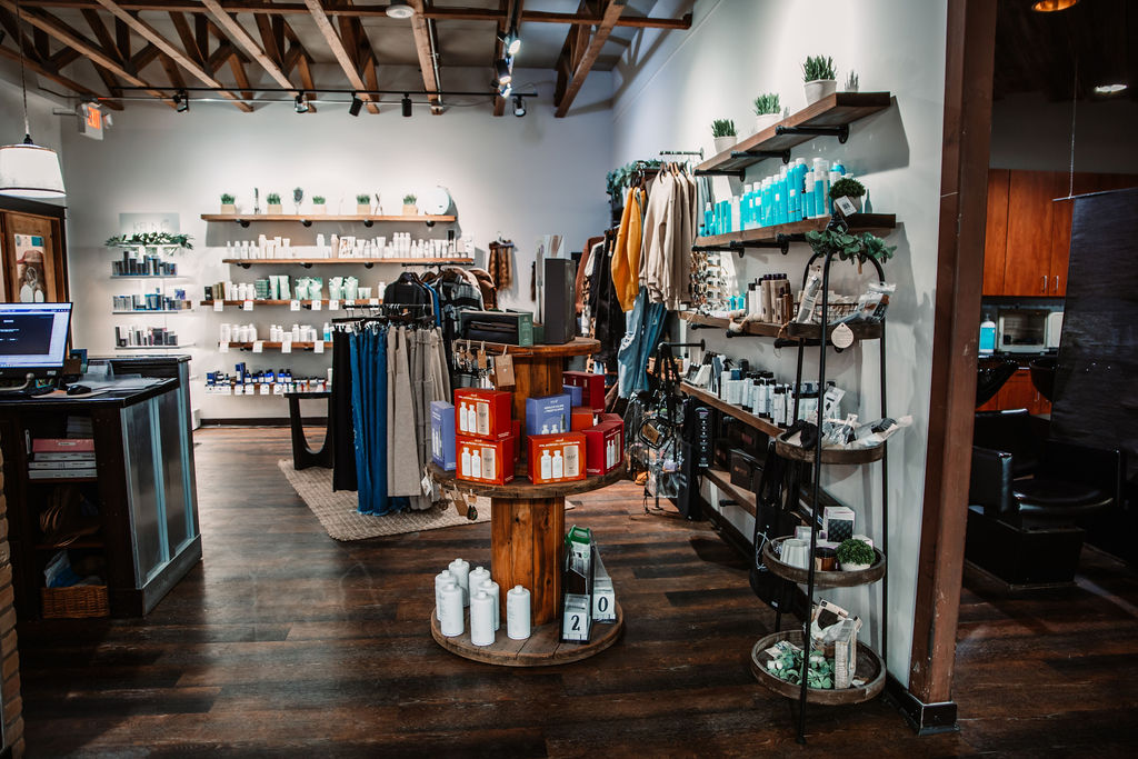 The retail shelves and the front of the salon